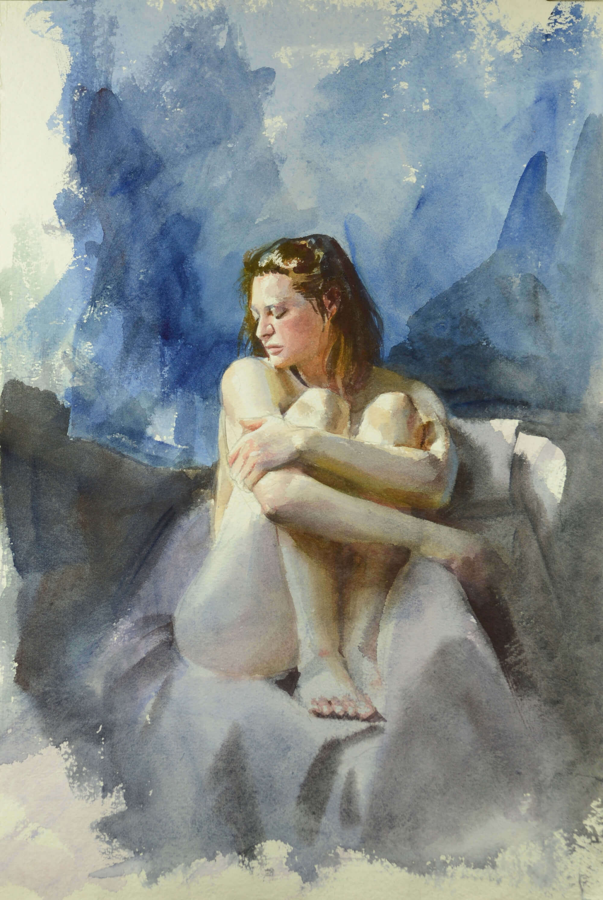 watercolor painting of a nude figure seated in a chair, knees held up to chin, gazing down to our left, in front of a blue backdrop