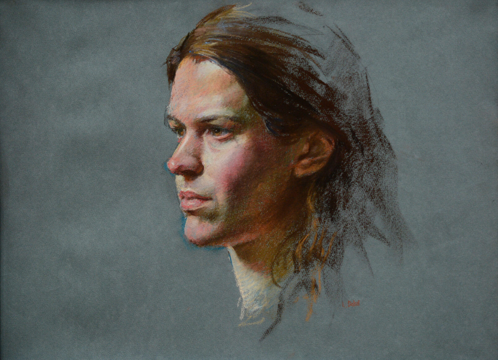Realistic pastel portrait of a woman in 3/4 view gazing off to the left of us on a gray paper background